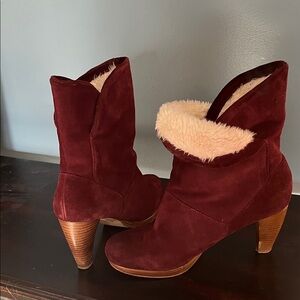 Wine colored suede ladies booties with faux fur lining.